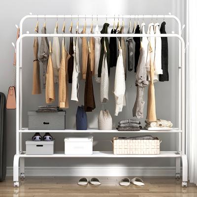 China Fashion factory direct sale landing home bedroom iron hanging storage clothes rack simple clothes rack for sale