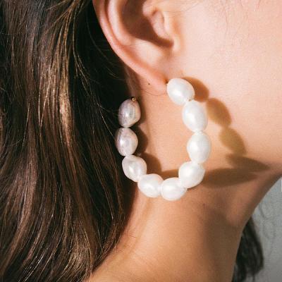 China FASHIONABLE Natural Bohemian Circle Earrings White Gravel Stone 5cm Circle Bead Stone Earrings for sale