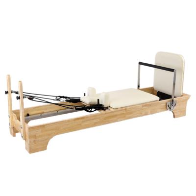 China 2021 Durable Wholesale Gym Fitness Yoga Pilates Studio Reformer Accessories Machine Core Training Bed for sale