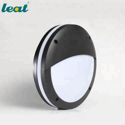 China IP54 Tempered Glass Round 220v 30w Led Garage Exterior Indoor Eyelid Wall Lights for sale