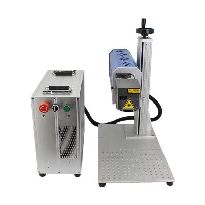 China Portable CO2 Laser 40w 60w CO2 Laser Marking Machine 30w Fiber Laser Marking Machine Air Cooled for sale