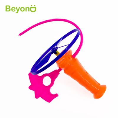 China Outdoor Plastic Kids Pull String Flying Disc Launcher Toy For Party Favors And Prizes Eco - Friendly for sale