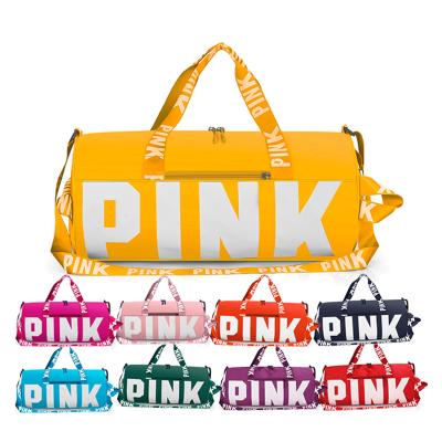 China Foldable wholesale custom canvas yoga gym duffel bag pink spinnanight spend overnight over da it has a custom logo duffle ladies sleep bags for women for sale