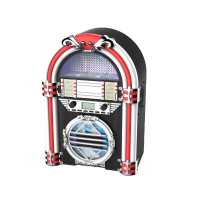 China Colorful LED Lights Jukebox Desktop FM Radio 10 Meters Retro Blue-tooth CD Player E-6H20 Jukebox for sale