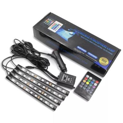 China Auto Lamp Auto Atmosphere Lamp 12 Led Interior RGB Car Led Foot Strip Lights With Remote Control Led Strip Lights for sale