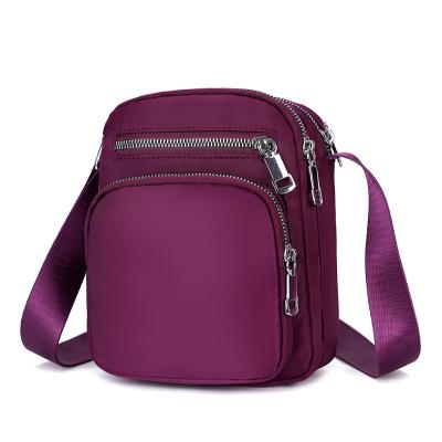 China Fashion Girls Bags Cross - Body Tote Fasion Personalized Mini Purple Cross - Body Handbags For Women for sale