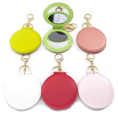 China Wholesale Decoration In Stock Cheap Custom Company Brand Mix Color Leather Pocket Logo Mirror Key Chain for sale