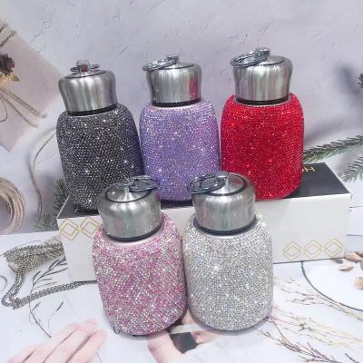 China 2022 Beautiful Bling Bling New Fashionable Rhinestone Beverage Bottle Portable Beverage Glasses Bottle Stainless Steel Water Bottle NJI001 for sale