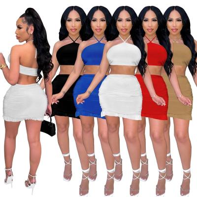 China Main solid color viable fashionable halter crop backless top two piece skirt set strapless top 2 pieces summer falbala short skirt set women for sale