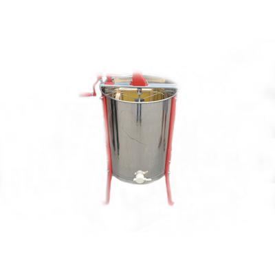 China Beekeeping Equipment Stainless Steel 4 Frame Manual Honey Extractor with Legs and Plastic Honey Gate en venta