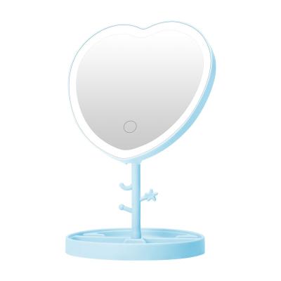 China Custom Heart Shaped Touch Screen Lighted Vanity Led Makeup Mirror Touch Screen Cosmetic Light Makeup Mirror With Storage Tray for sale