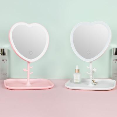 China High Quality Girly Desktop Portable Touch Screen LED Mirror Dormitory Makeup Mirror Personalized Heart Shaped Mirror With Storage Tray for sale