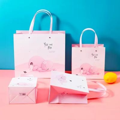 China Printed Kraft Paper Bag Recyclable Customized Shopping Paper Bag For Clothing Packing With Customer Logo for sale