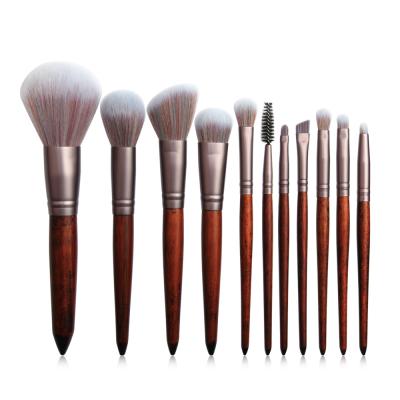 China Wholesale Price Private Label 11pcs Face/Eye Hair Wood Handle Durable Soft Dense Nylon Makeup Brush Set for sale