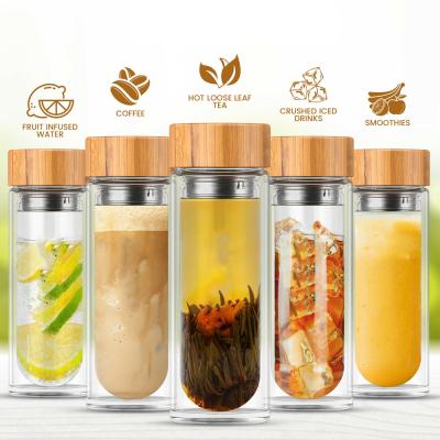 China 500ML 17OZ Eco Glass Water Bottle Large Wall Viable Natural Bamboo Double Gauge Lid for sale