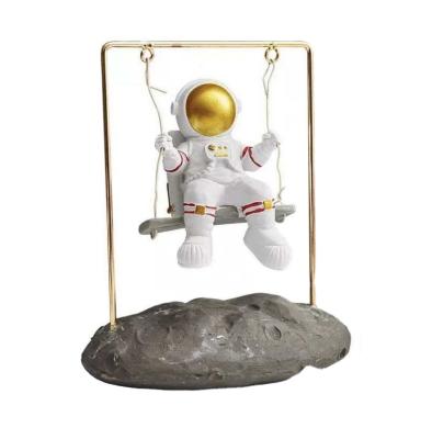 China Astronaut Furnishings Living Room Decor Low MOQ Home Swing Art Table Art Decoration for sale