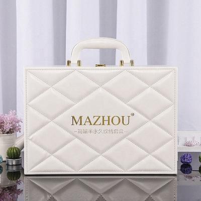 China Recycled Materials Luxury White Empty Cosmetic Packaging Leather Box With Handle Skin Care Product Packaging Box for sale