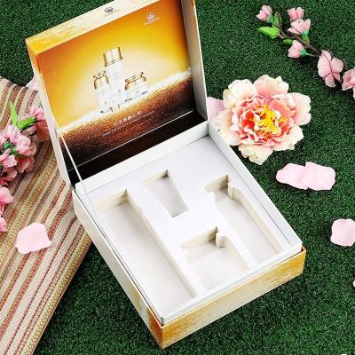 China Recycled Materials Customized Paper Box Luxury Rigid Cardboard Packaging Box Essential Oil Cosmetic Product Packaging Box With EVA for sale