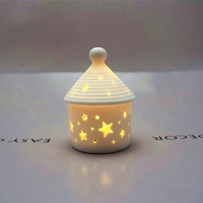 China Hollow Christmas Concise Ceramic Round House Led Energy Saving Lamps Ornaments Bedside Lamps for sale