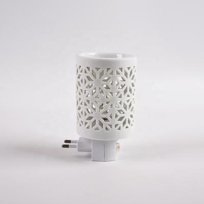 China Garden Decoration Cavity Design Garden Decoration Electric Wax Melter Tart Warmer Plug-in Candle Heaters Oil Burner for sale