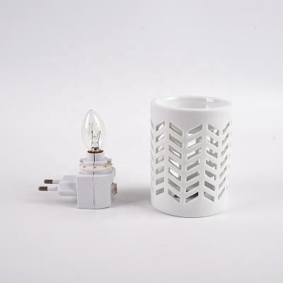 China Garden Decoration Ceramic Electric Aroma Oil Burners For Tea Light Sconce for sale