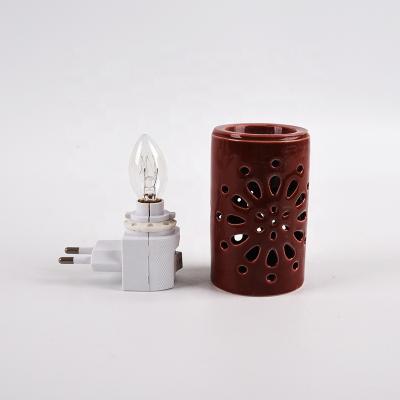 China Garden decoration cavity design ceramic oil burner ceramic aroma plug-in outlet personalized electric oil burner for sale