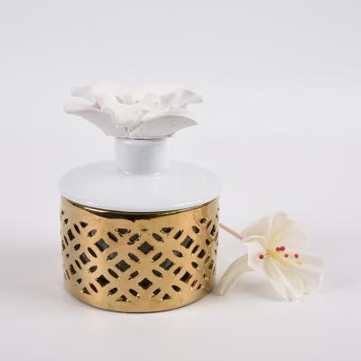 China Ceramic Tubular Diffuser Home Decoration Diffuser Bottle With Ceramic Flower for sale