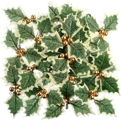 China Handcrafted Artificial Holly Berry with Green Leaves for Christmas Braid Layout Cake Toppers Open Wedding Party Decorations for sale