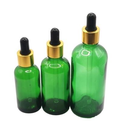 China Cosmetic Pharmaceuticals 30ml 50ml 100ml green essential oil bottle glass serum dropper bottle cosmetic glass bottle with dropper for sale