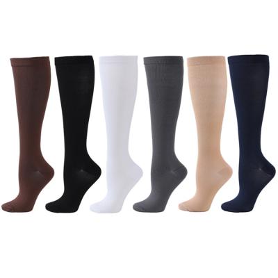 China Solid Color Breathable Wholesale Sport Socks High Knee Sports Medical Men Women Nylon Compression Socks for sale