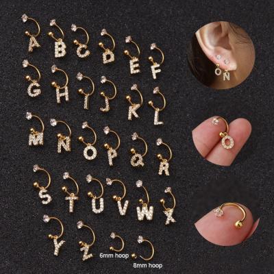 China Simple Nickel Free Stainless Steel Cartilage Earrings 26 English Alphabet Zircon Diamond Letter Stud Earrings for sale