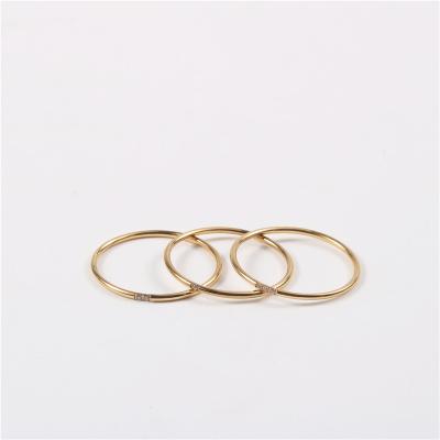 China Small Single Diamond Ring Nickel Free 18k Gold Plated Light Gold Ring for sale