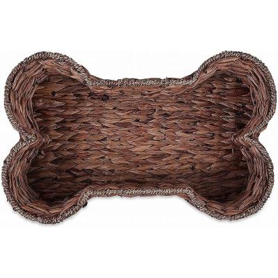 China Nordic Bone Shaped Handmade Water Hyacinth Pet Storage Collection Dog Toy Basket for sale