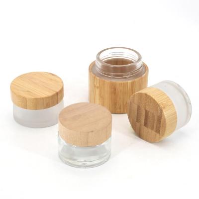 China Non Spill Cosmetic Cream Bottle Wood Lid Customized Bamboo Bottle Lid for sale