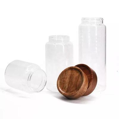 China Non Spill Acacia Wood Lid For Food Spice Honey Or Candle Glass Jars for sale