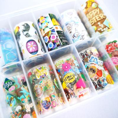 China Easy Apply New Color Nail Foil Cartoon Nail Color Foil Wholesale Easter Transfer Paper Rabbit Easter Egg Flower Cartoon Starry Transfer Sticker for sale