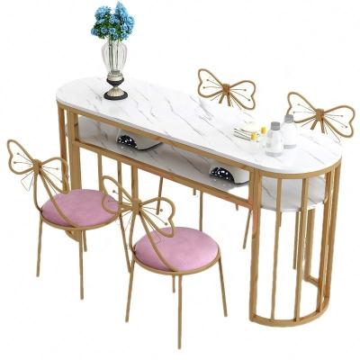 China Modern 2023 GetGold Modern New Design Simple Marble Top Nail Table and Chair Set for sale