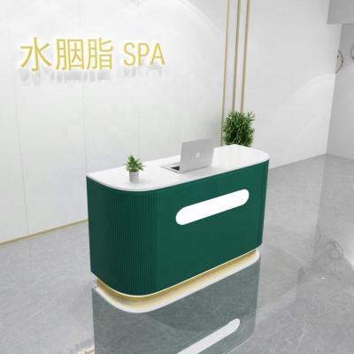 China Convertible GetGold Reception Desk Wood For Nail Salon 2022 Gold Nail Salon Reception Desk With Led Light for sale