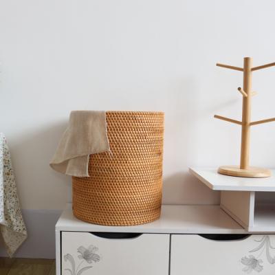 China Bathroom Clothes storage portable cylinder rattan woven laundry baskets for sale