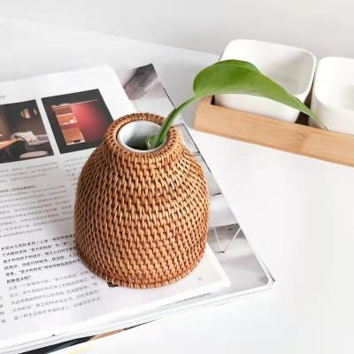 China Sustainable Mini round decorative flower arranging hand woven rattan vase for sale