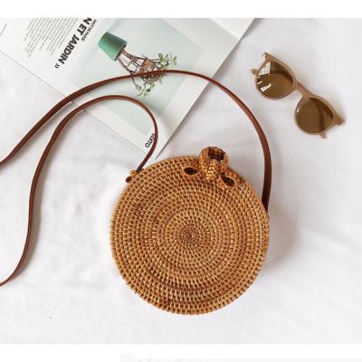 China Sustainable Handwoven Round Rattan Bag Shoulder Leather Straps Natural Chic Hand Rattan Bag for sale