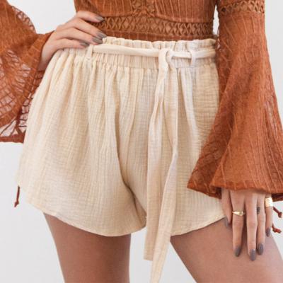 China 2021 summer vacation casual style QUICK DRY loose waist high shorts drawstring waist solid color women beach shorts for sale