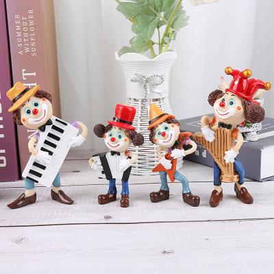 China Europe Resin Playing Piano Clown Ornaments Christmas Party Decoration Crafts for sale