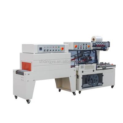 China Automatic Tunnel L Type Sealer Sealing Packaging Food DQL5545 Heat Shrink Machine for sale