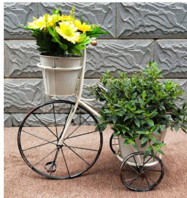 China Modern American rural balcony balcony bicycle shelf European foreign trade iron garden plant outdoor rack for sale