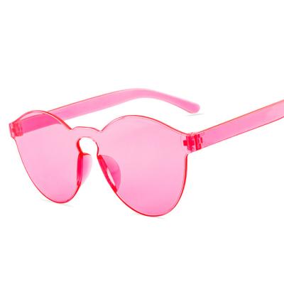 China Fashion Sunglasses 9803 Low Price Women's Custom Eyewear Frames Rimless Sun Glasses UV400 Color Round One Piece Rimless Candy for sale