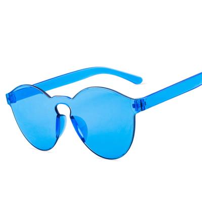 China Fashion Sunglasses Wholesale 9803 Low Price Women's UV400 Custom Eyewear Frames Rimless One Piece Color Round Rimless Sunglasses Wholesale Candy for sale