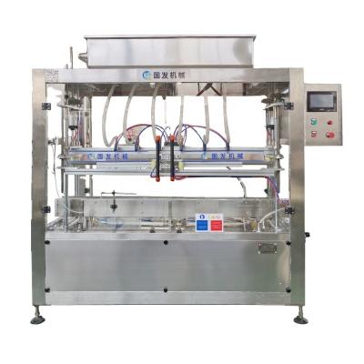 China Automatic Food Glass Water Bottle Filling Machine Liquid Maker Material Gravity Stainless Steel Filling Machine for sale