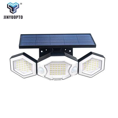 China Adjustable LED Head 2023 New waterproof Home Outdoor Garden Energy Saving 3 Heads Solar Motion Sensor Wall Light for sale