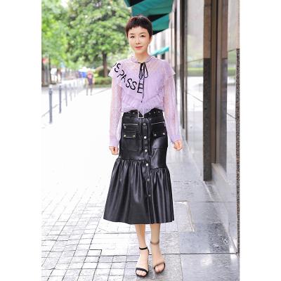 China 2020 factory wholesale women's leather skirts anti-static with elastic waist buckles in the center front leather skirts for sale